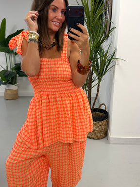 The Deluxe Gingham Peplum Top - Coral